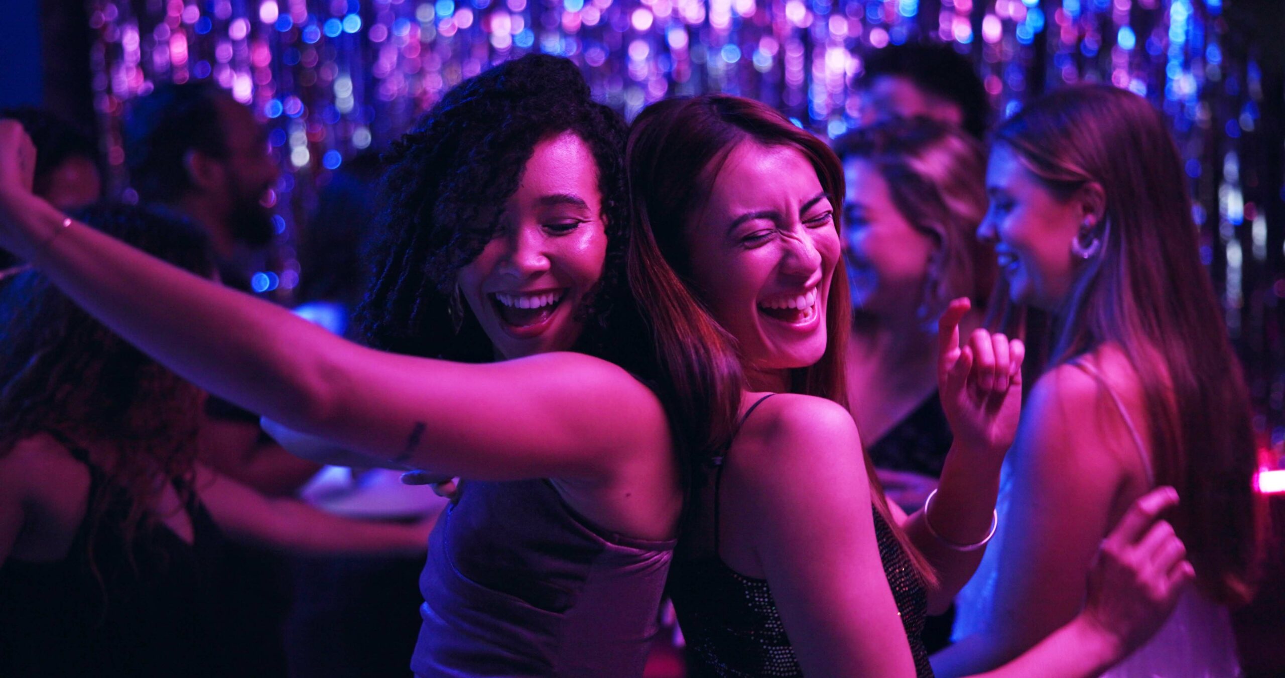 Dancing, energy and friends in club, night and fun for women