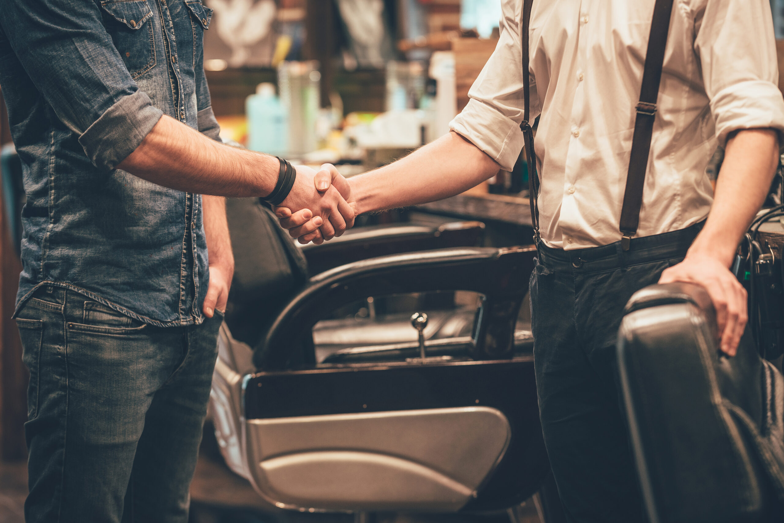 Handshake in a barbershop