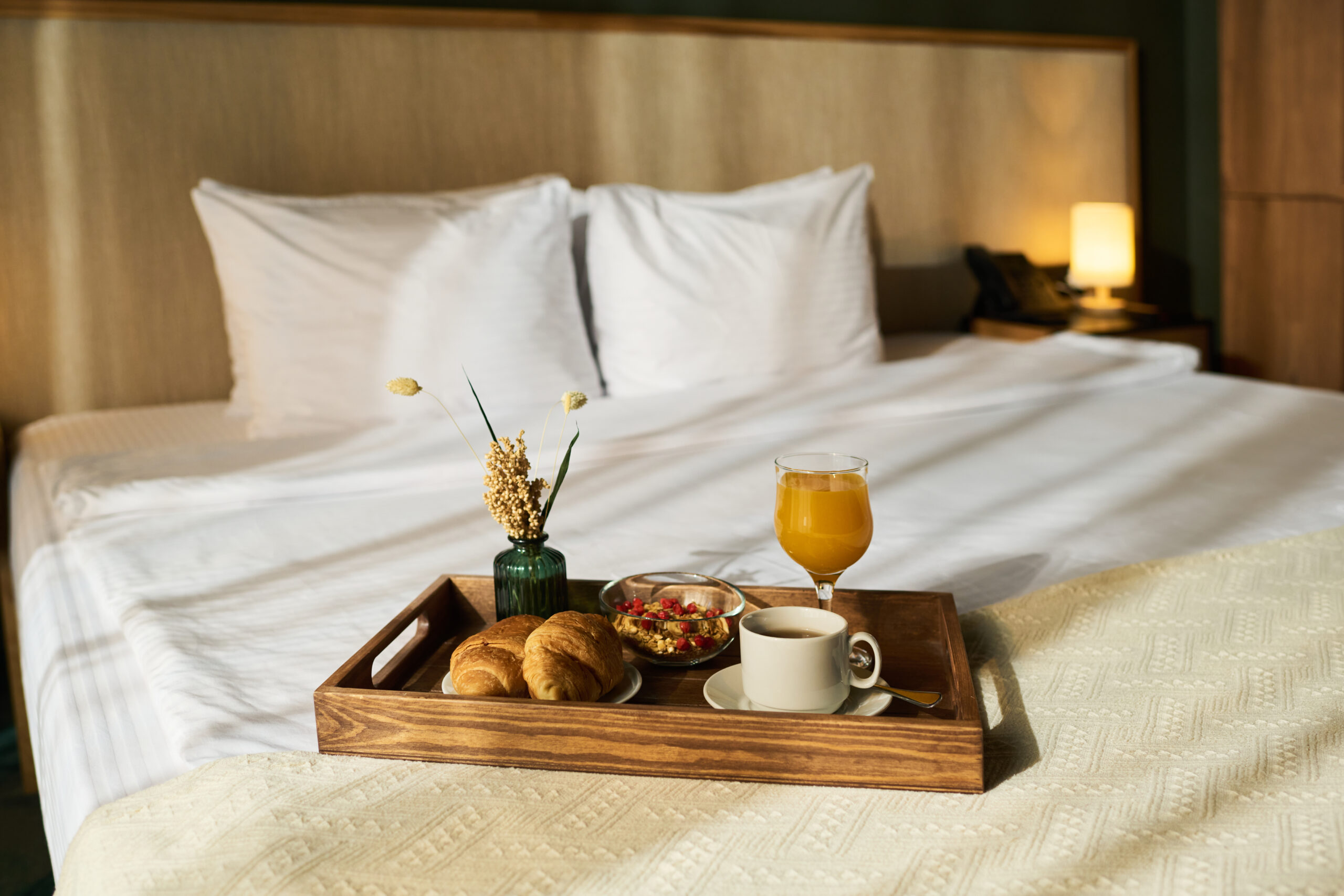 Breakfast On A Bed In A Hotel Room 