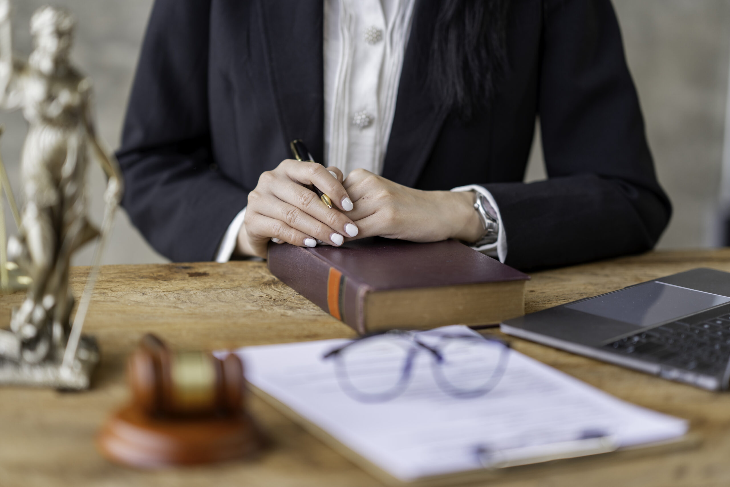 Solicitors in Brighton: Professional Woman Working In Office Setting