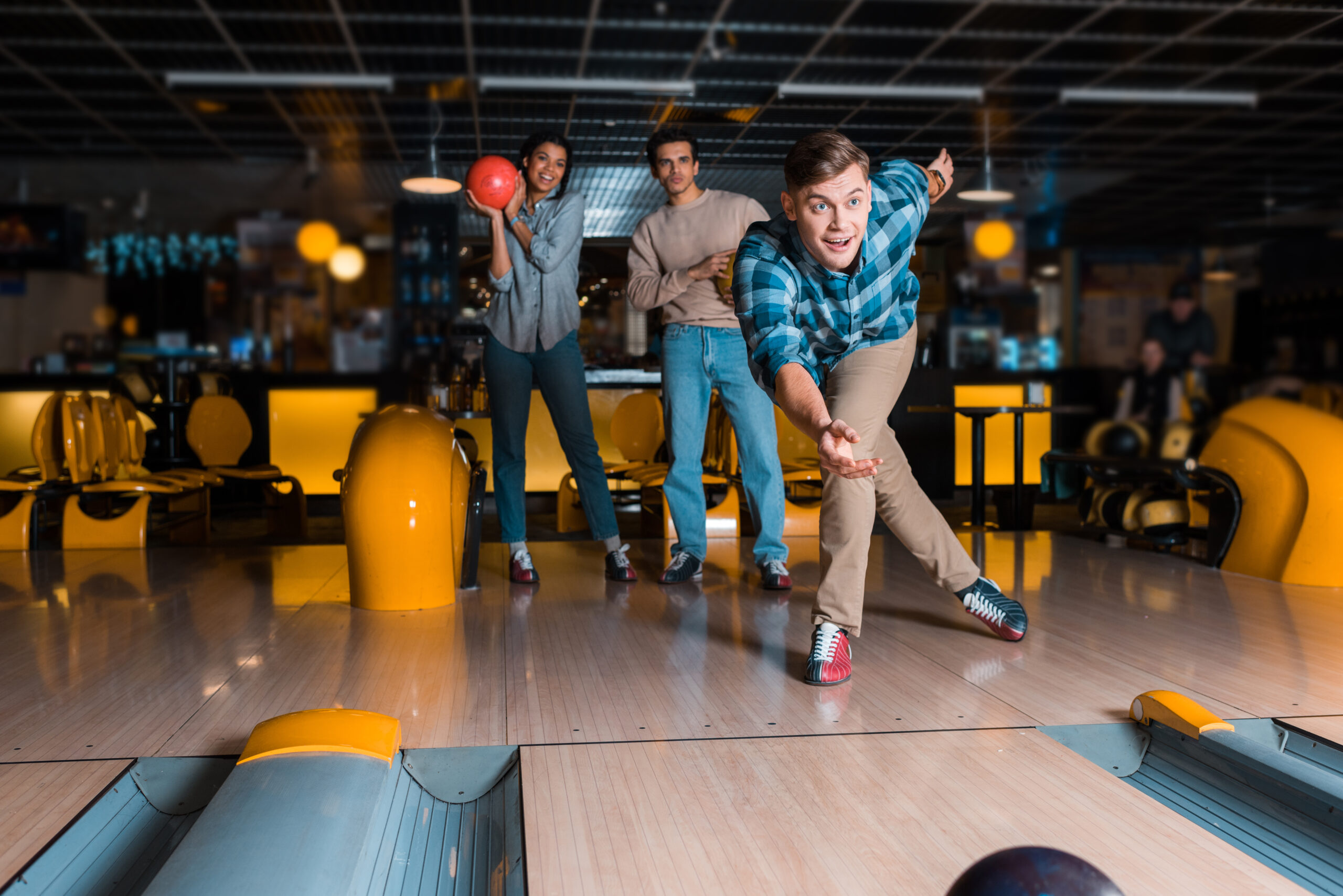 Smiling Young Man bowling in Brighton