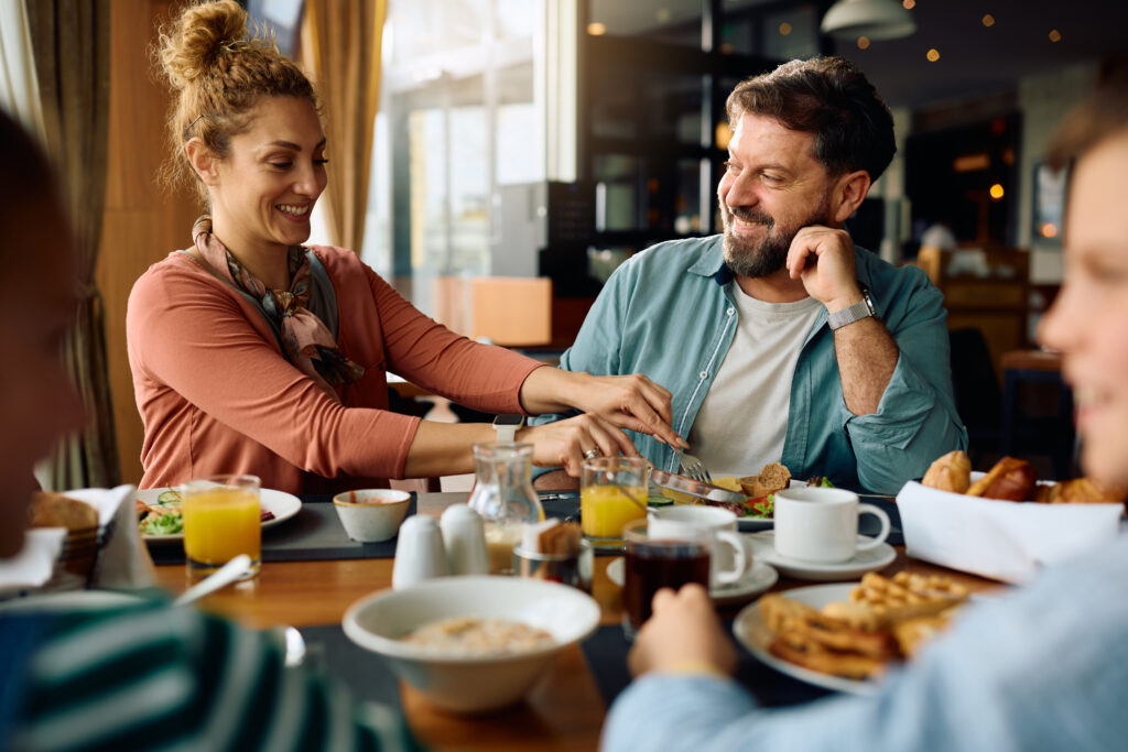 Happy Couple Enjoying In Family Breakfast At Dinin 2026 03 17 07 05 49 Utc Scaled