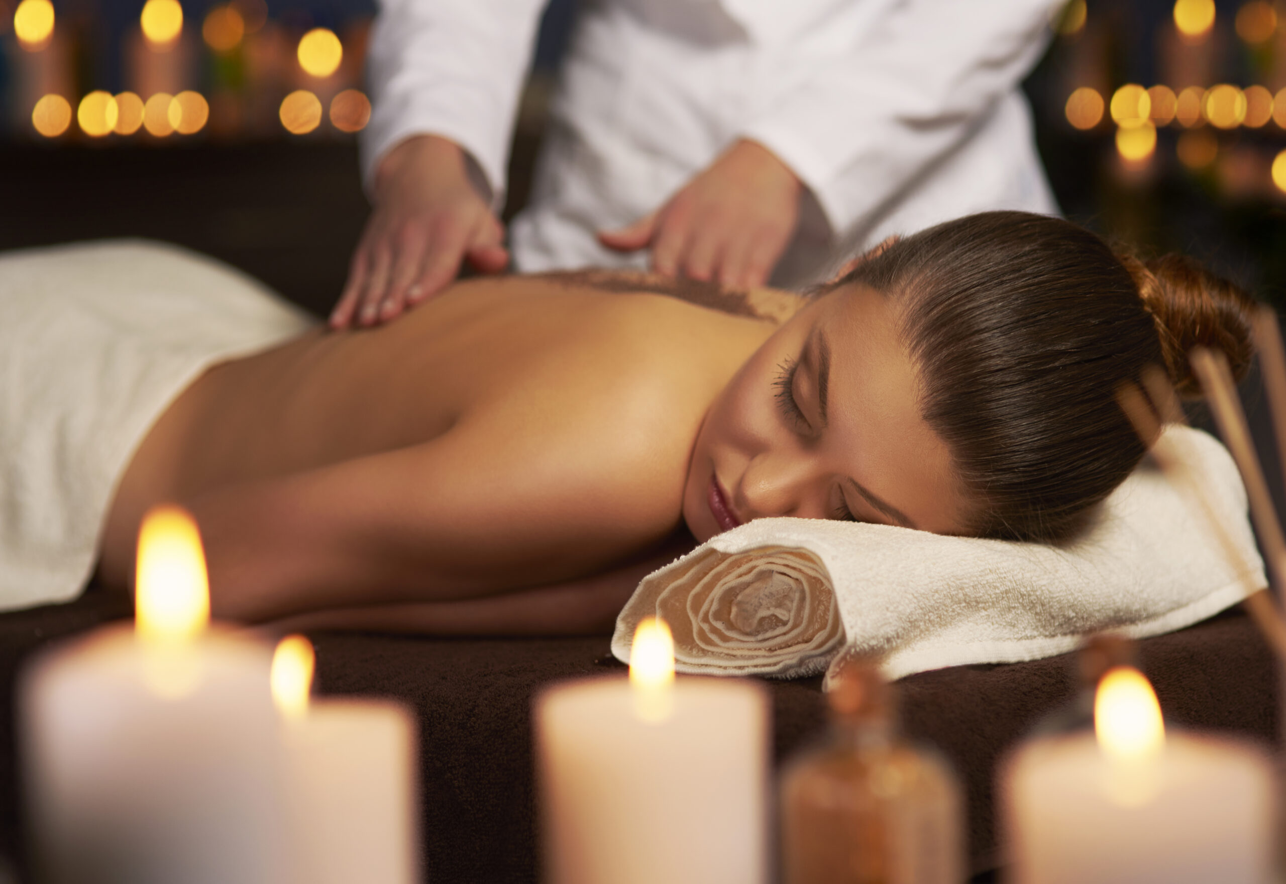 A relaxed woman having a massage