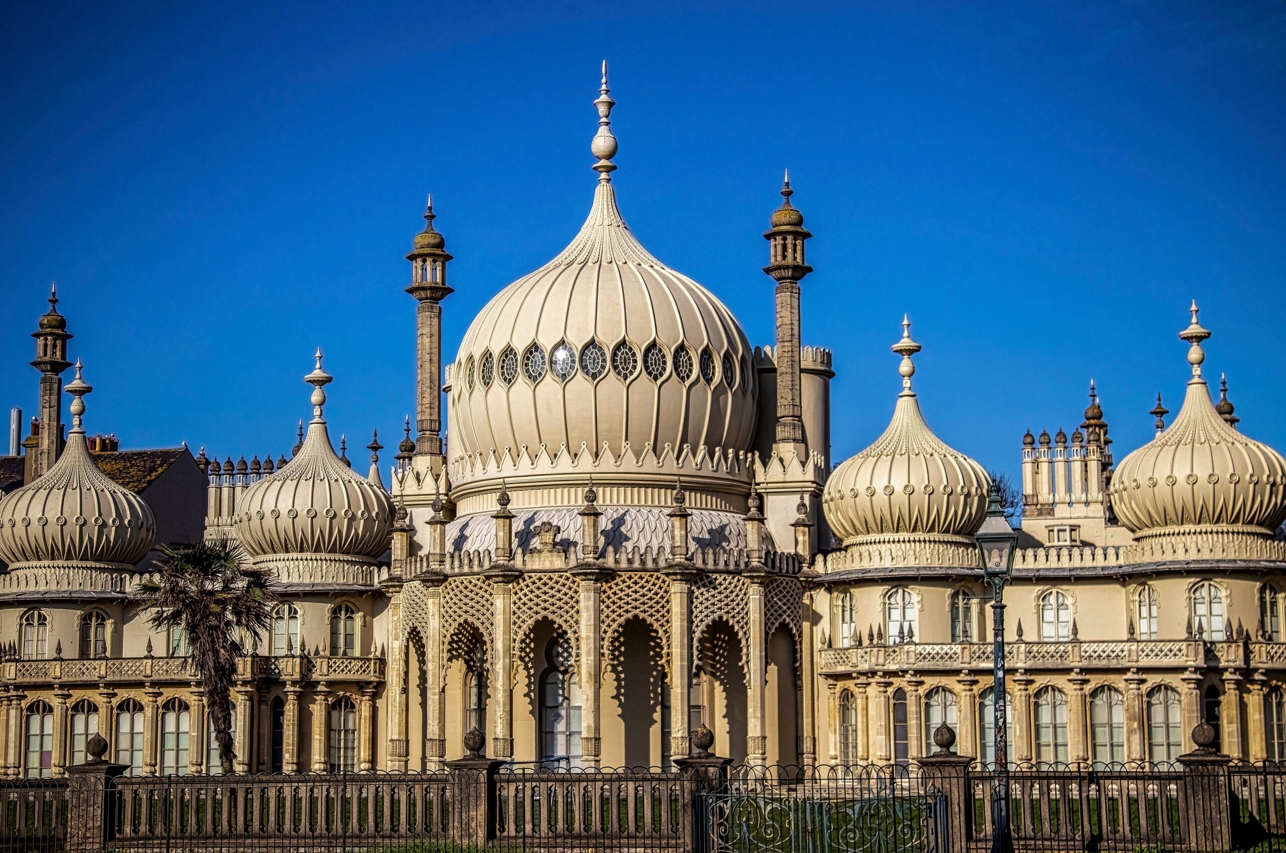 The Brighton Royal Pavilion buildings under blue sky