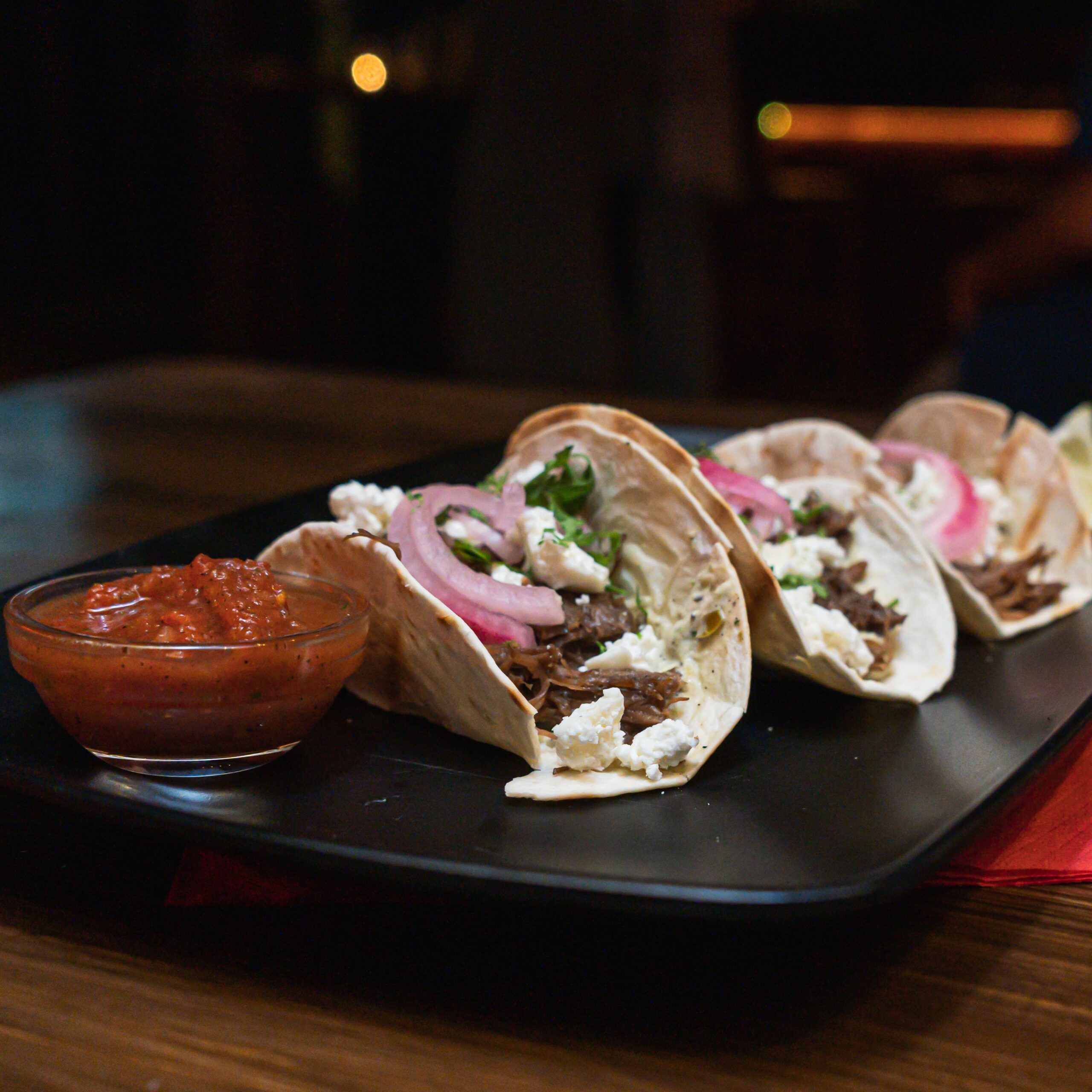 Delicious Tacos With Fresh Salsa On Plate