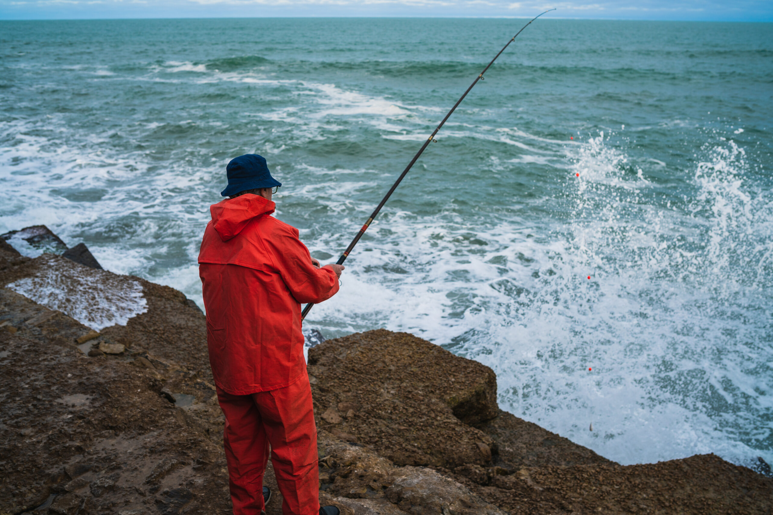 A man fishing in the sea