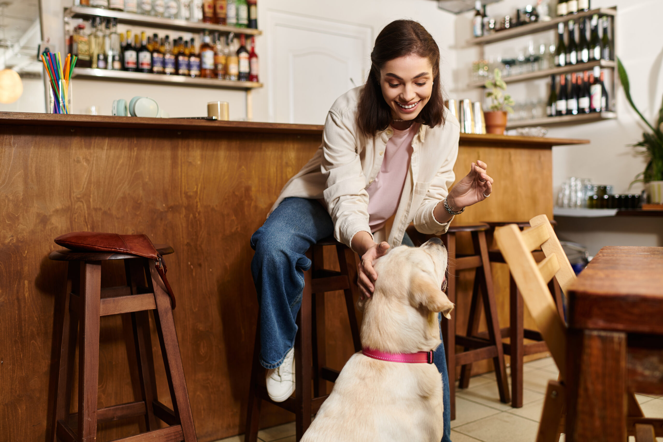 Young Woman Enjoys Time With Her Labrador