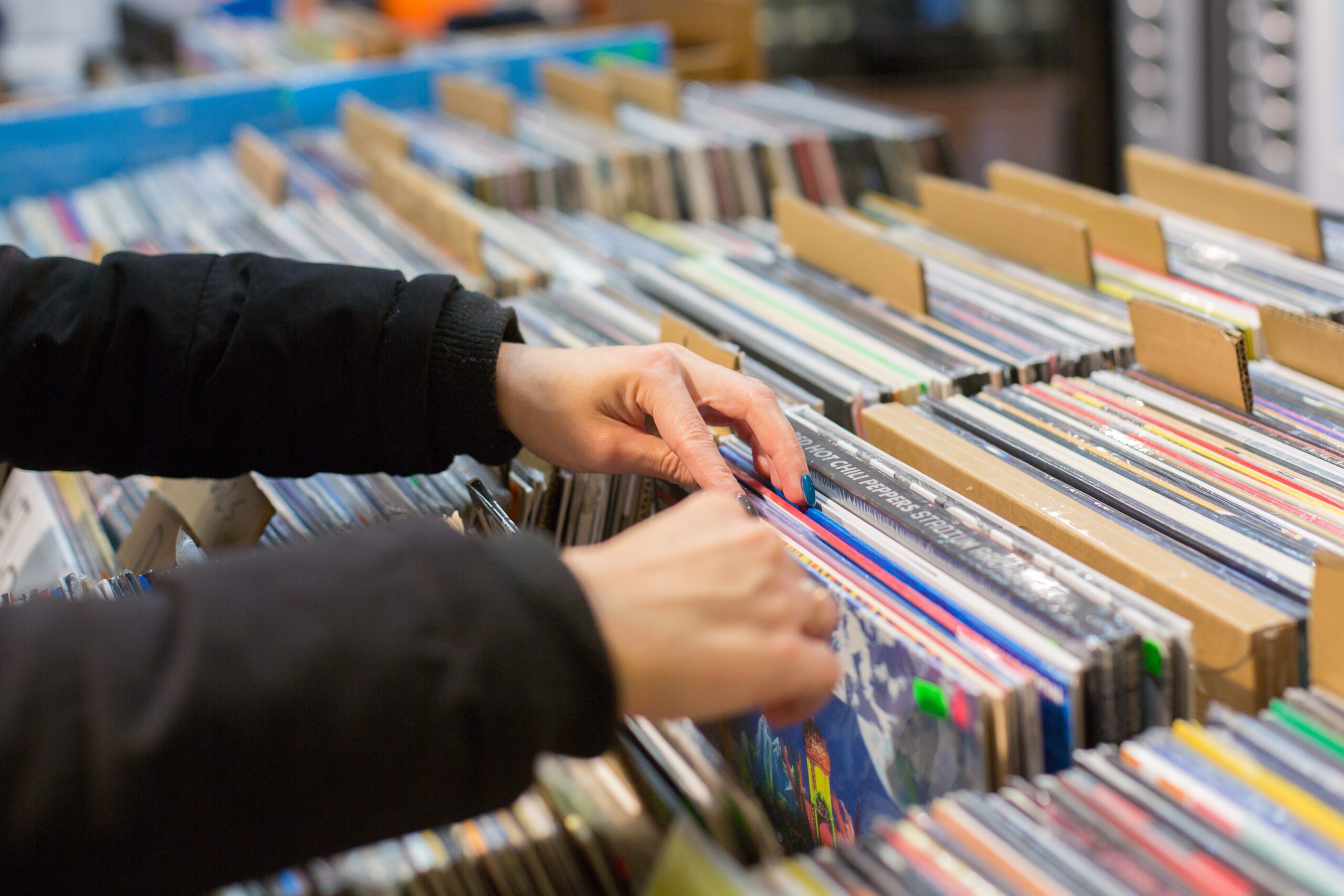 Young Music Love looks through records in one of the record shops in Brighton