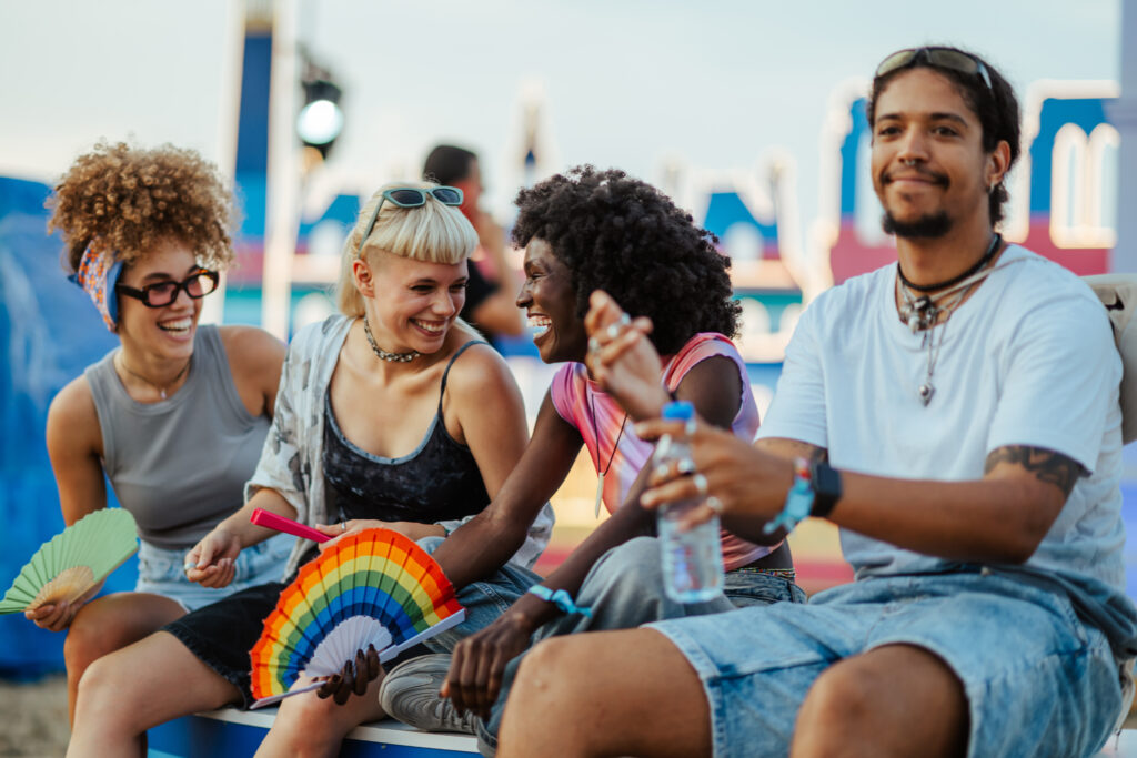 Friends At An Outdoor Summer Music Festival 