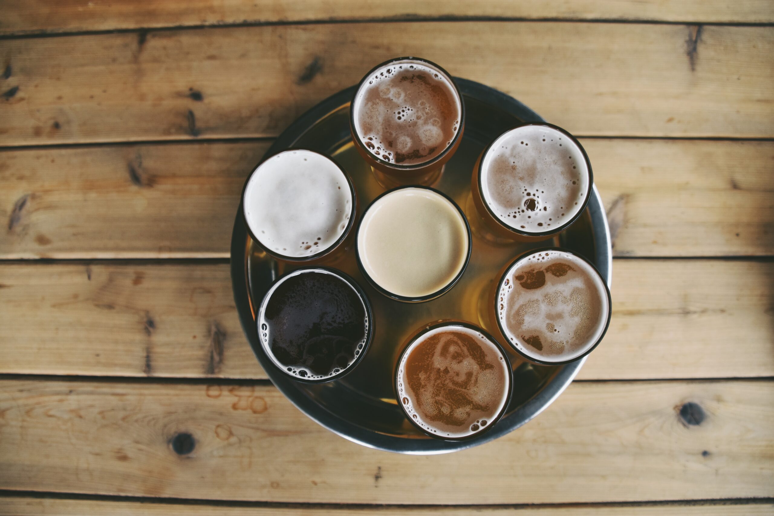 Tray Of Beer On Wooden Table