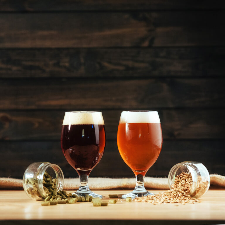 Craft beer in Brighton: Two glasses of beer on a wooden table