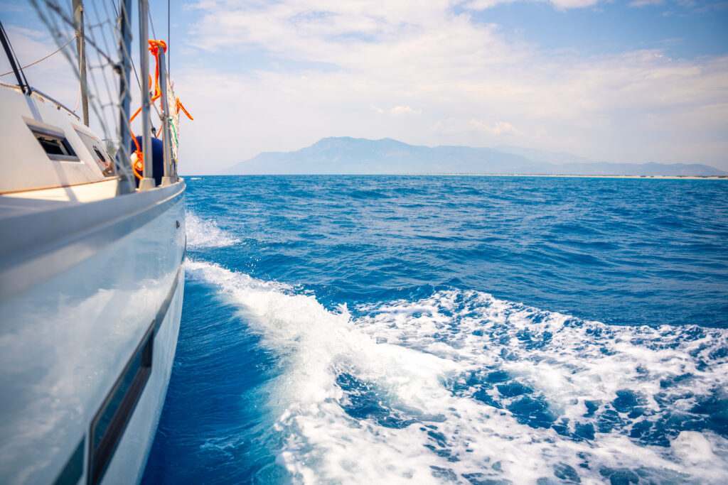 Yacht Sailing In An Open Sea