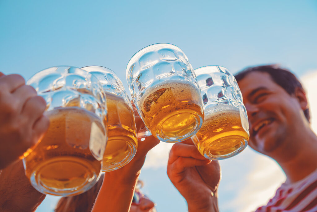 Close Up Beer Glasses toasting