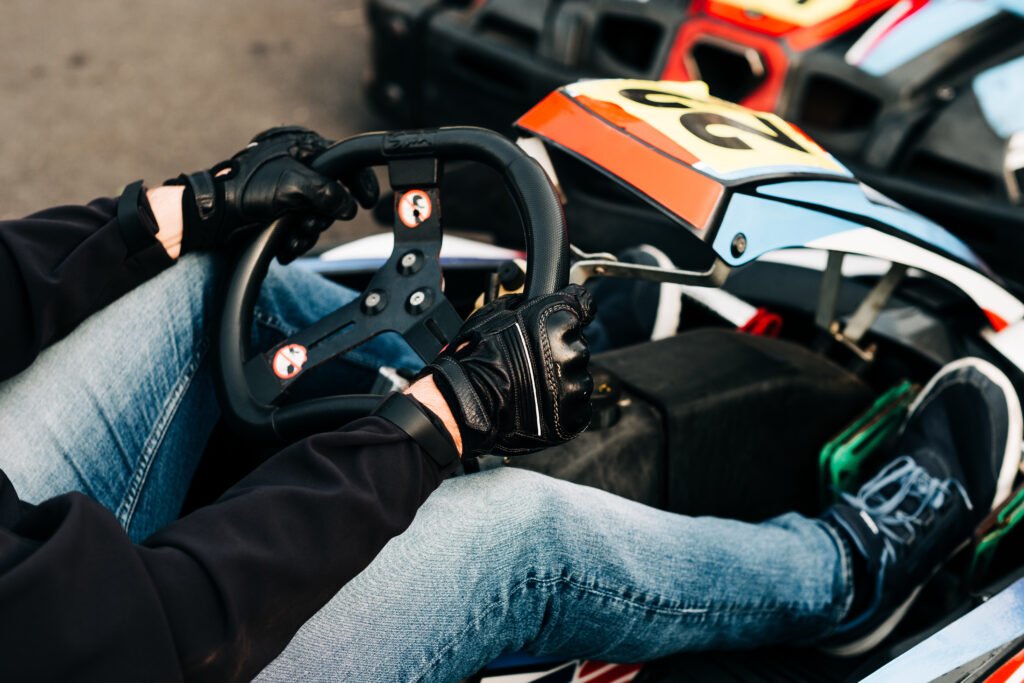 A closeup shot of a person in a racing car