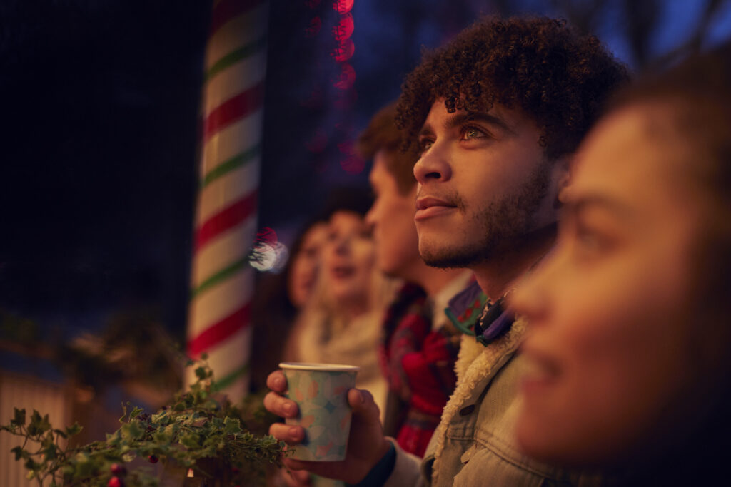 Group Of Friends Drinking Mulled Wine