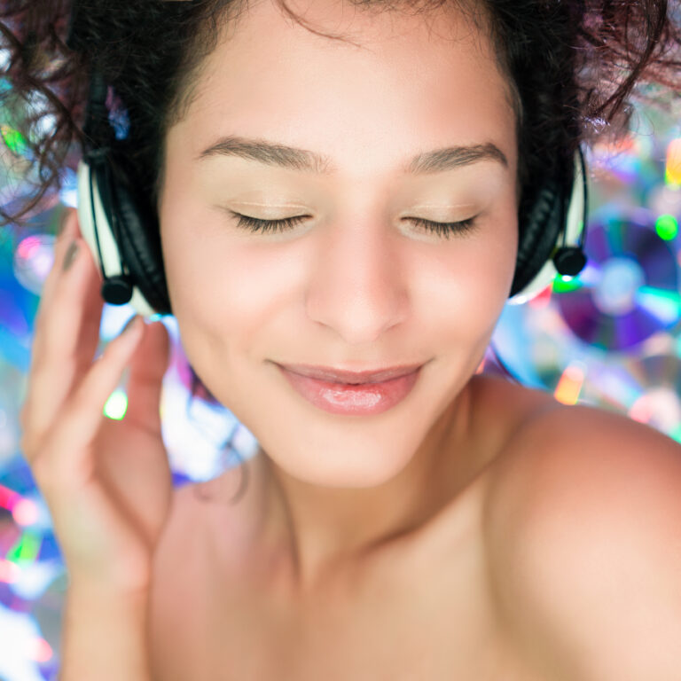 Woman Enjoying Music at a silent disco in Brighton
