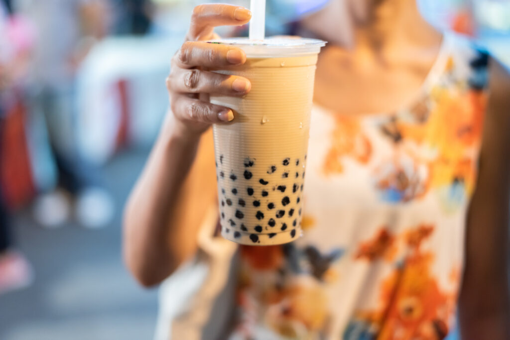 Woman Holding Refreshing bubble Tea Beverage Close Up